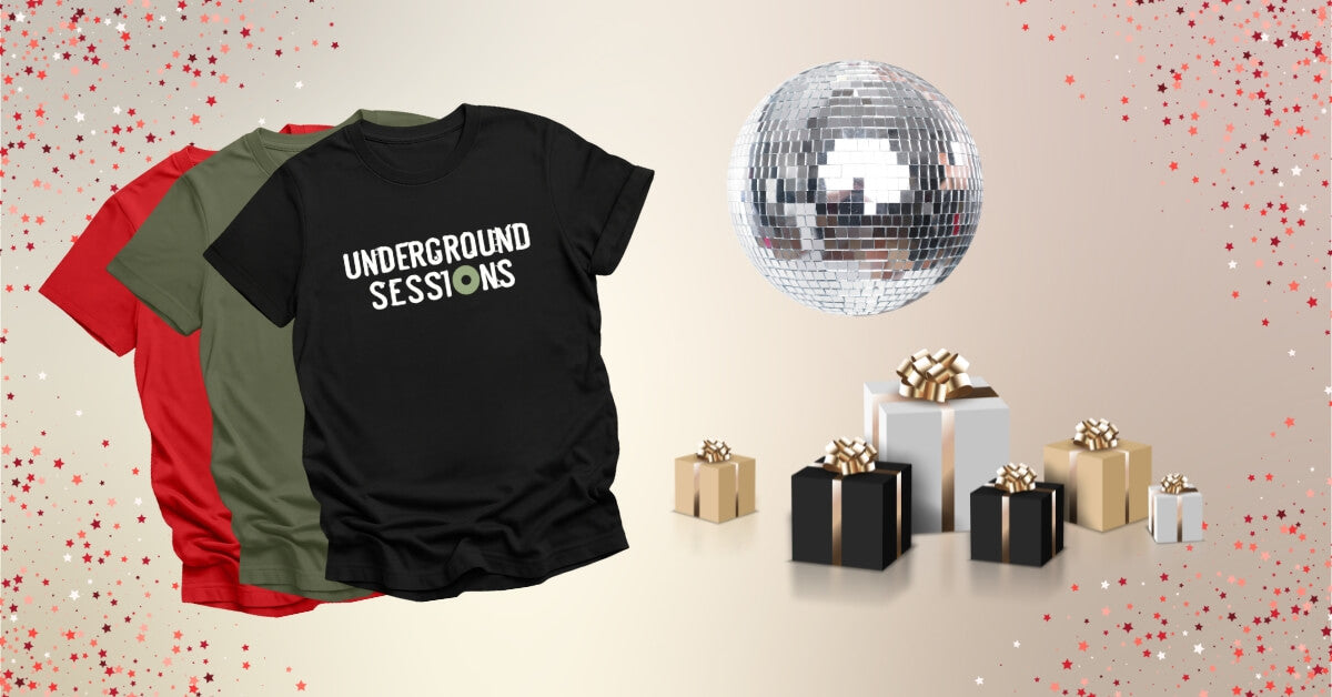 Photo of DJ T-Shirts next to a stack of presents